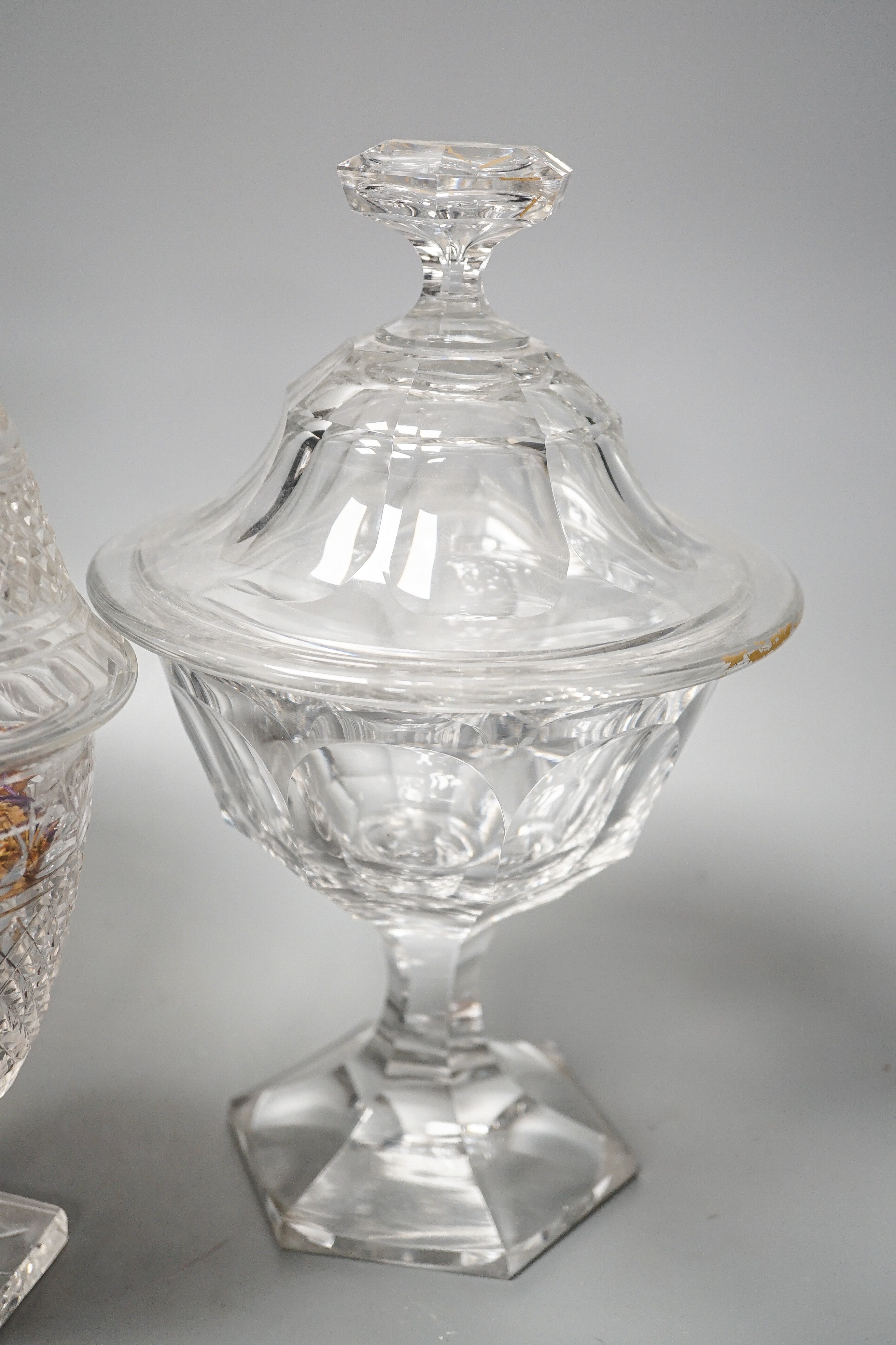 Two pairs of 19th century cut glass glass sweetmeat jars and covers (one a.f.), tallest 25 cms high.